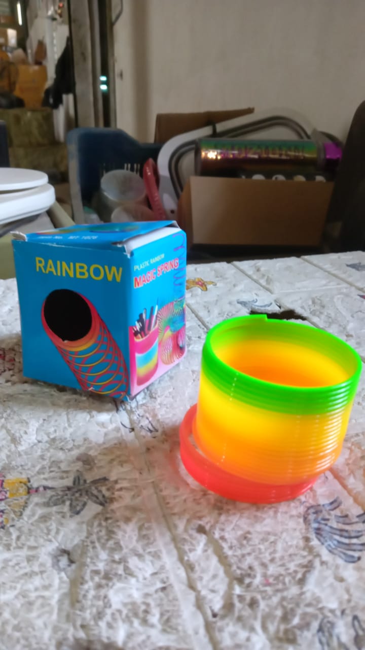 Rainbow Slinky Spring Toy – Compact, Portable Fun Toy for Kids & Adults, Great for Birthdays (1 Pc) Rainbow Slinky Spring Toy – Compact, Portable Fun Toy for Kids & Adults, Great for Birthdays (1 Pc)